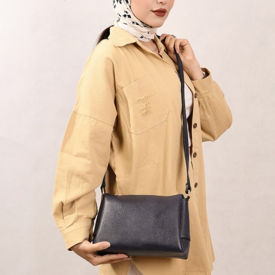 کیف زنانه مجلسی طرح نسیم چرم فلوتر بنفش